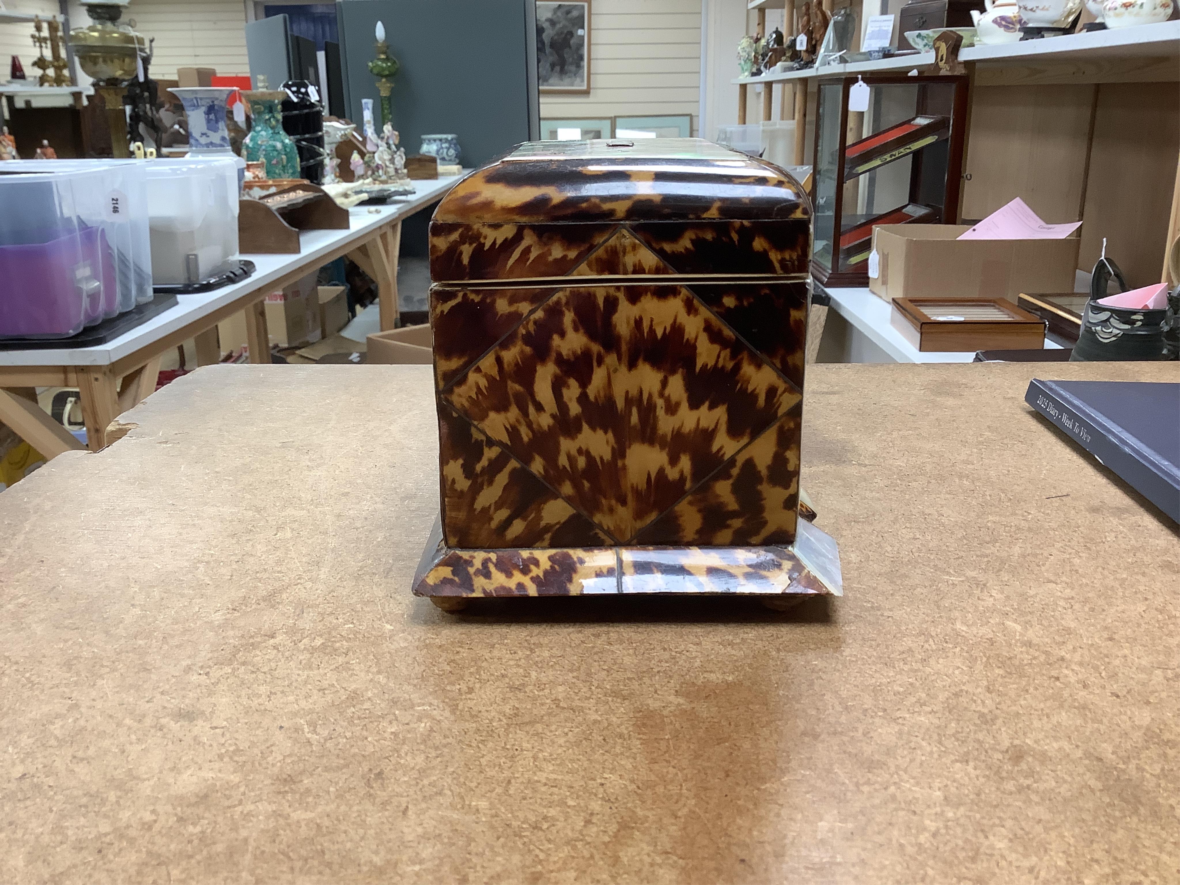 A mid 19th century decorative tortoiseshell and mother of pearl tea caddy, 20cm wide x 12.5cm high CITES Submission reference CXXC25Q1